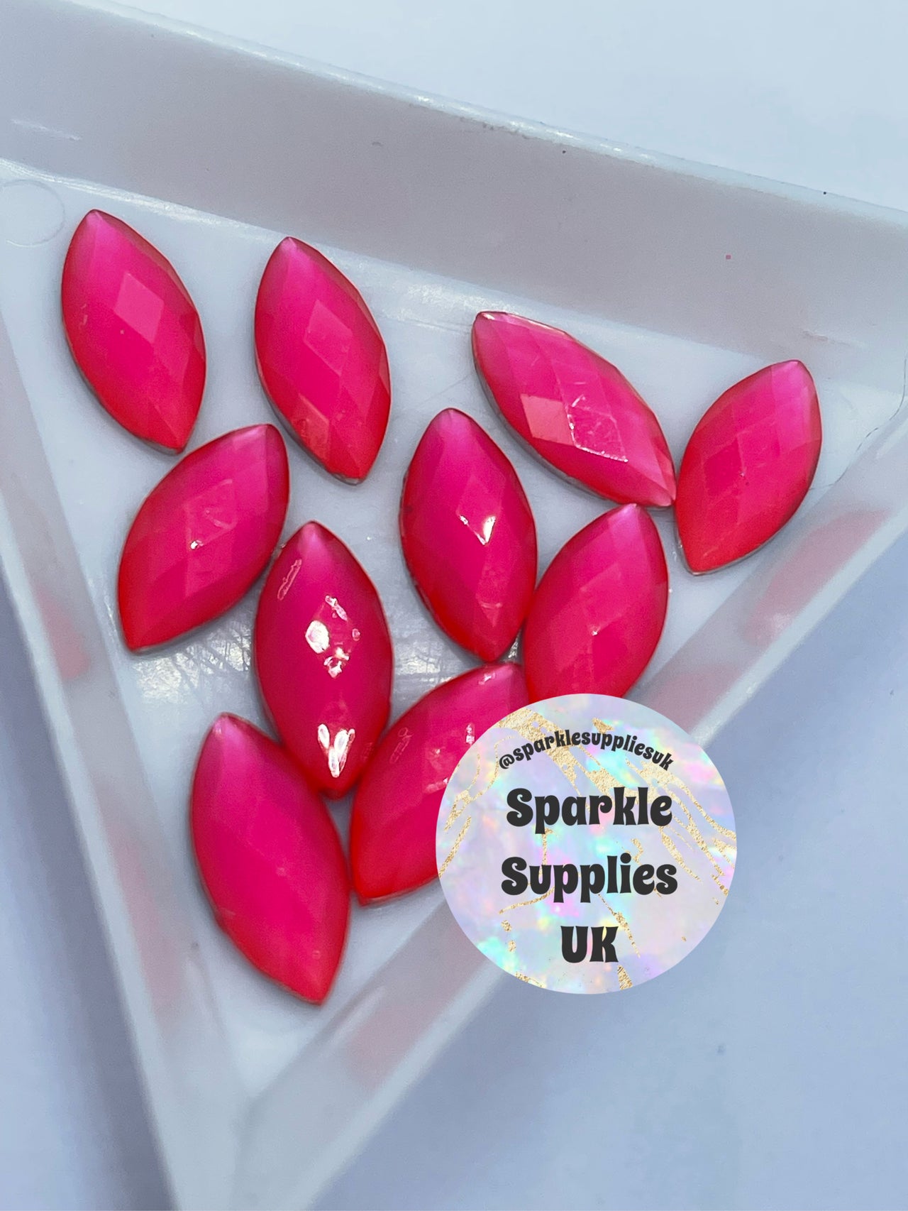 Neon Pink Cat Eye Gems (10’s)