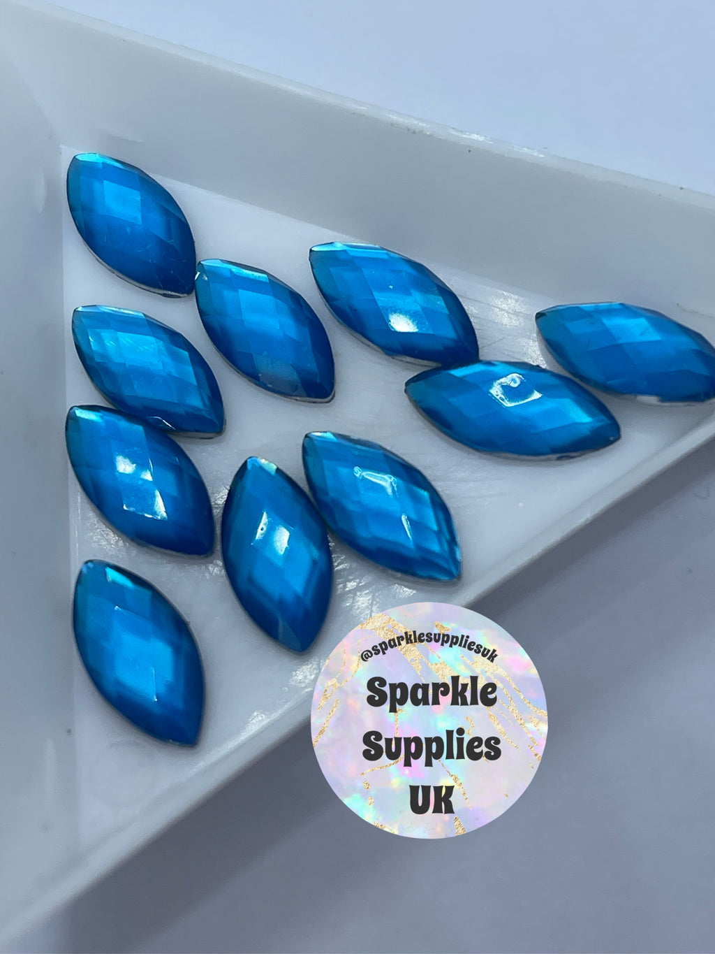 Neon Blue Cat Eye Gems (10’s)