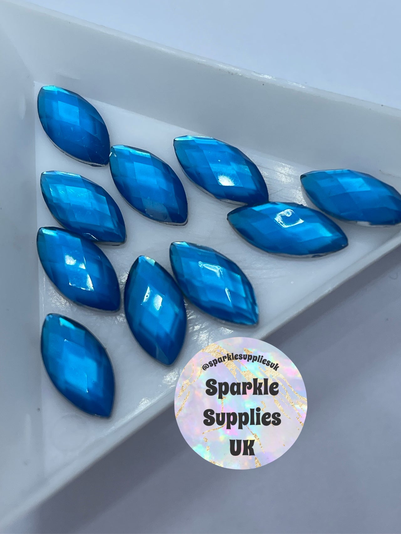 Neon Blue Cat Eye Gems (10’s)